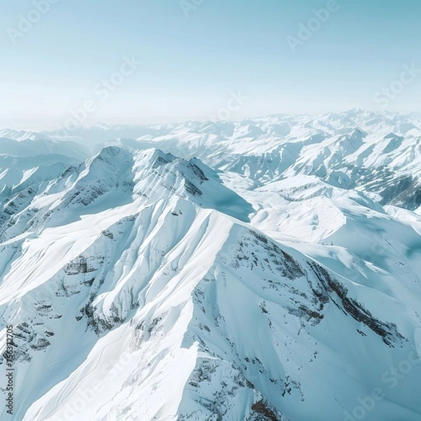 Obraz Aerial View of Snow-Capped Alpine Peaks Under a Clear Blue Sky: A Serene Winter Wonderland