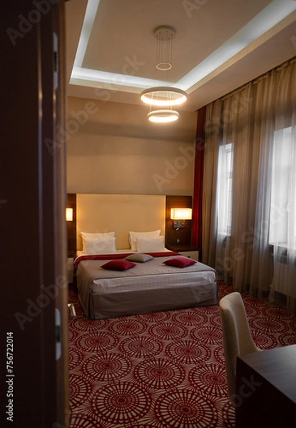 Fototapeta Immerse yourself in an atmosphere of elegance and beauty thanks to the refined interior design of our restaurant.