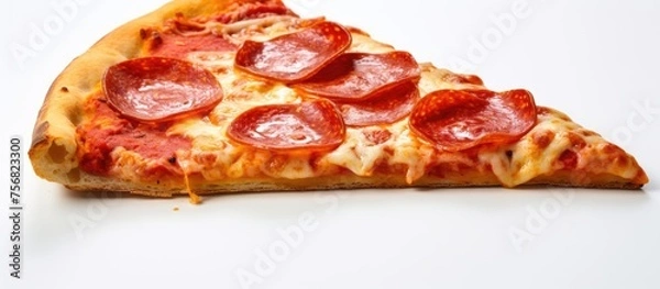 Fototapeta A slice of pepperoni pizza topped with melty pizza cheese on a white surface. This dish is a classic Californiastyle pizza with meat as the main ingredient