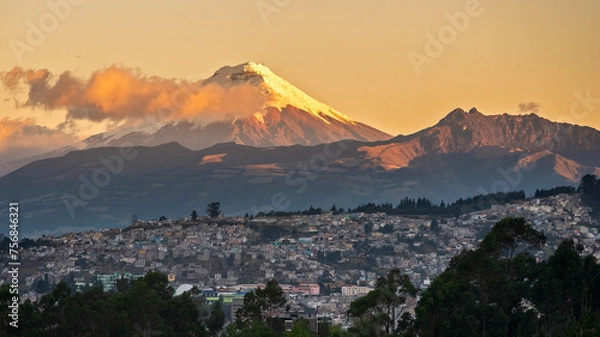 Fototapeta South-east of the city of Quito and the Cotopaxi volcano (5897m) illuminated by a golden sunset light