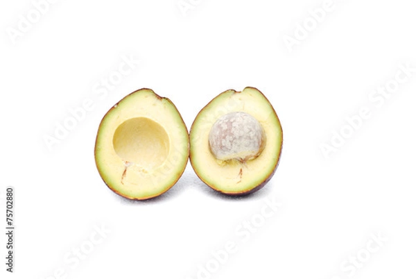 Obraz Halved avocados on white background