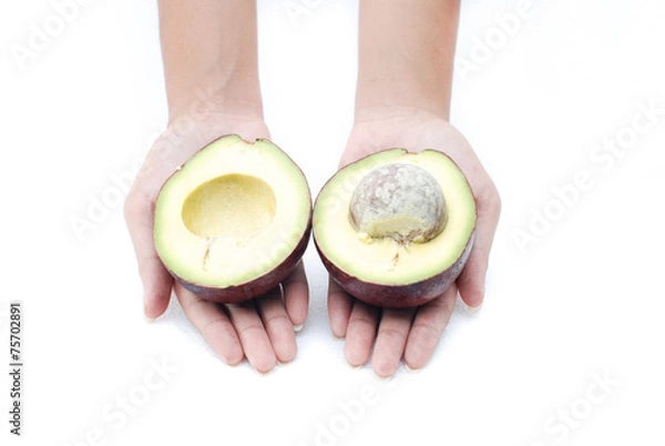 Obraz Isolated halved avocado
