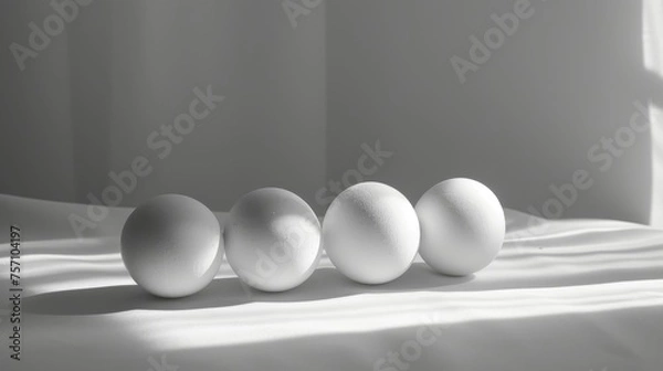 Fototapeta Elegant mozzarella balls with light and shadow play on a soft texture