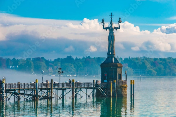 Fototapeta Nice close-up view of the famous Imperia statue with the pier at the harbour entrance of Constance (Konstanz) by Lake Constance (Bodensee) in Germany. 