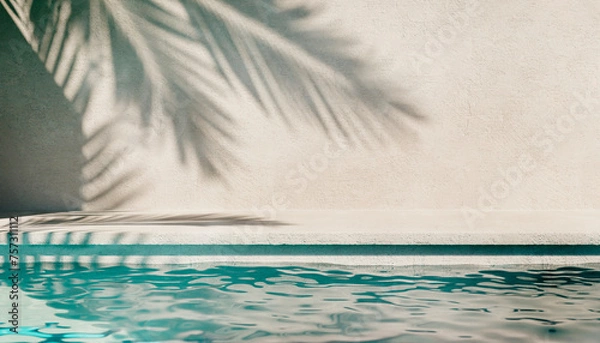 Fototapeta Tropical summer background with plaster wall, pool water and palm shadow. Luxury hotel resort poolside scene mockup template. Beach vacation holiday house with neutral architecture aesthetic.