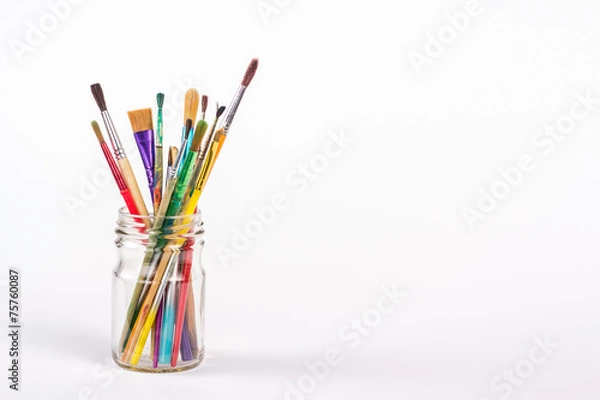 Obraz isolated paints brushes in a glass