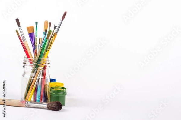Obraz isolated paints brushes in a glass