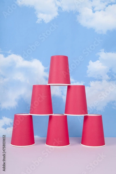 Obraz a pyramid of red disposable paper cups