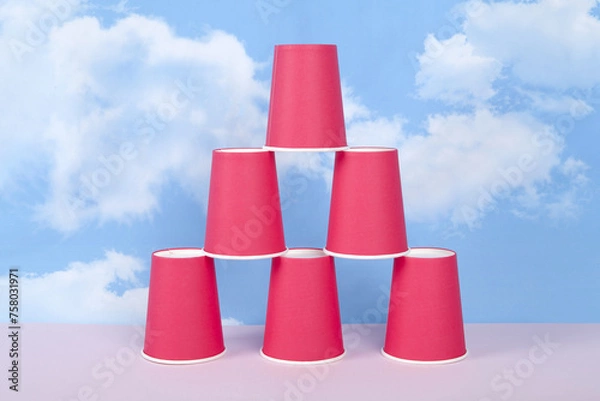 Obraz a pyramid of red disposable paper cups