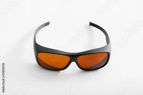 Obraz Safety glasses for cosmetologists, doctors to work with laser, isolated on a white background