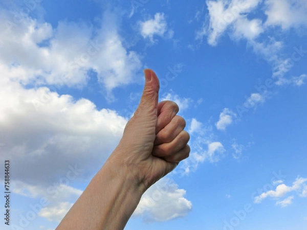 Obraz 青空と人の手　指サイン