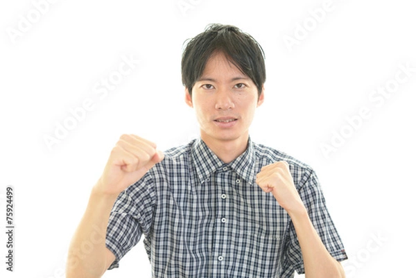 Fototapeta ガッツポーズの男性