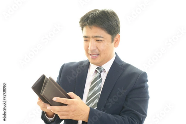 Fototapeta 財布を持つ男性