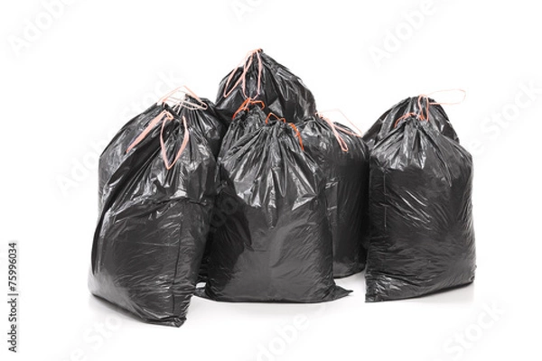 Fototapeta Bunch of garbage bags isolated on white background