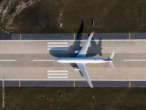 Obraz Aerial view of an airport. aerial view of airport terminal with parked airplanes