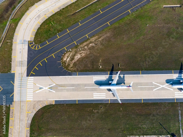 Fototapeta Aerial view of an airport. aerial view of airport terminal with parked airplanes