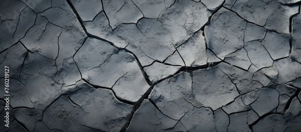 Fototapeta Dramatic Abstract Background with Cracked Textured Surface and Intriguing Patterns
