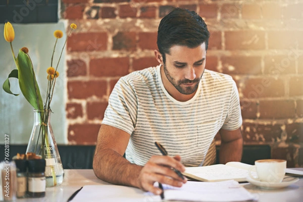 Fototapeta Man, coffee shop and planner for writing ideas, inspiration and writer for creativity in restaurant. Male person, journal and checklist for story or author, calm and peace in cafe for script project
