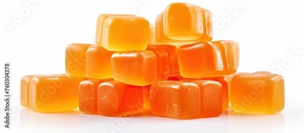 Fototapeta Vibrant Stack of Orange Chewing Gums on a Clean White Background