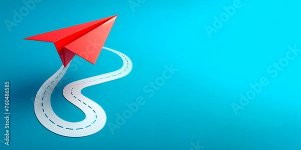 Fototapeta A red paper plane isolated on a blue background, banner with space for text