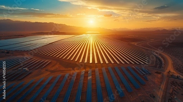 Fototapeta An aerial view of a vast solar farm in the desert