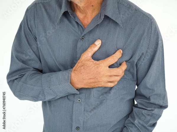 Obraz Man holding chest from pain. Heart attack symptom. Medical and health concept.