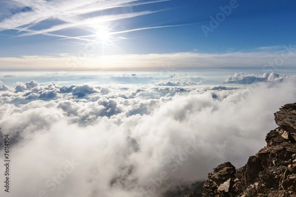Fototapeta Panoramic view of the clouds over the Alps from Gouter hut