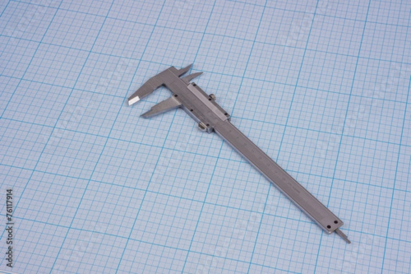 Fototapeta Vernier-caliper on graph paper