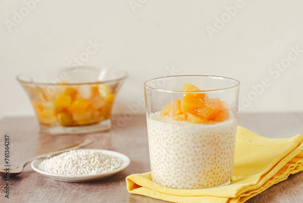 Obraz Tapioca pudding with vegan milk and exotic fruits compote