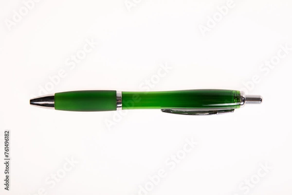 Obraz red pen on a white background