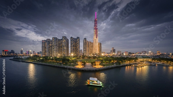 Fototapeta 
Afternoon sunset on the tallest building in Vietnam. Below is the Saigon river and the boat is running. Photo taken in June 2023