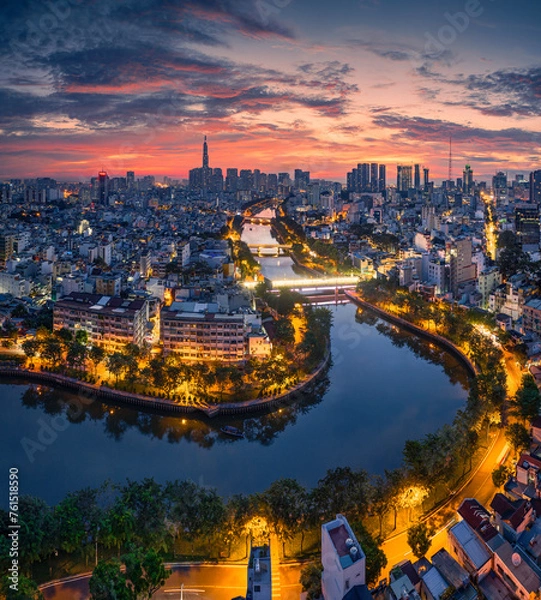 Fototapeta 
Sunrise on the tallest Landmark 81 building in Vietnam, with a beautiful curved road. Photo was taken in November 2023.
