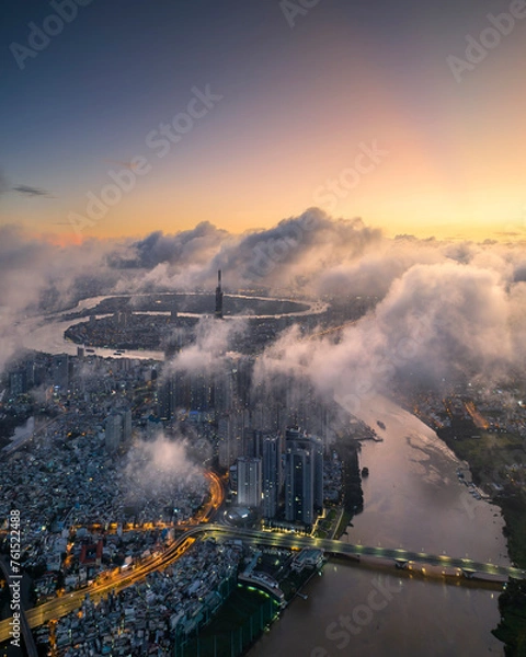 Fototapeta 
The top of the Landmark 81 building, the tallest in Vietnam, floats in the clouds. Photo taken in August 2023