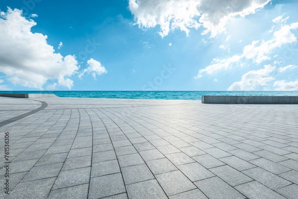 Fototapeta Empty square floor and blue sea with sky clouds background