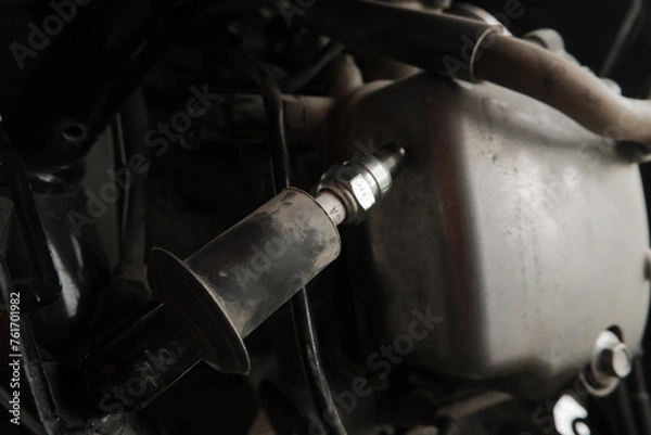 Fototapeta Spark Plug Inspection and Maintenance, Inspection Prior to Installation in engine ignition and electrical systems at motorcycle garage.repair and maintenance motorcycle concept.