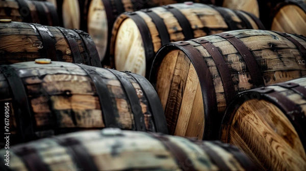 Obraz A row of barrels with a brown wood finish. Whiskey barrels