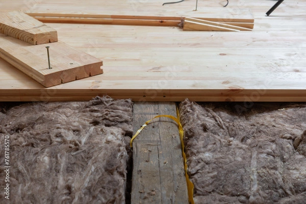 Obraz Creating a new wooden plank floor. House renovation