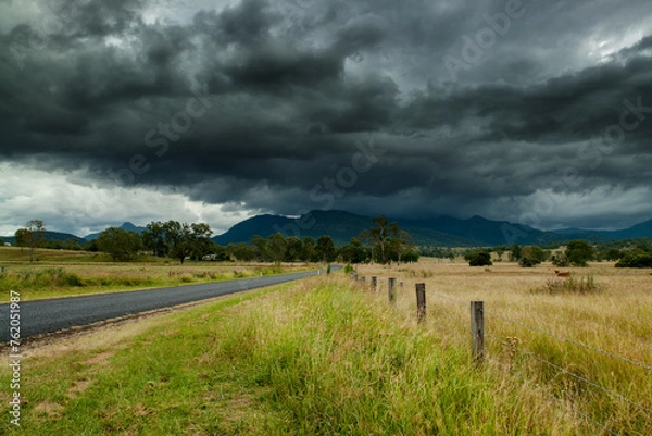 Fototapeta rainy day with storm clouds in the countryside of Queensland, Australia