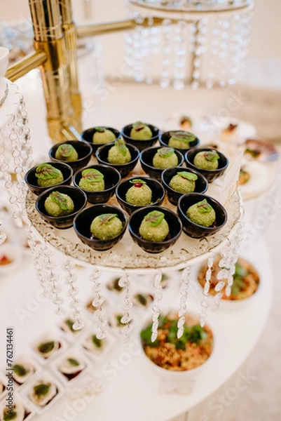 Obraz Luxury event - finger foods served on elegant plates