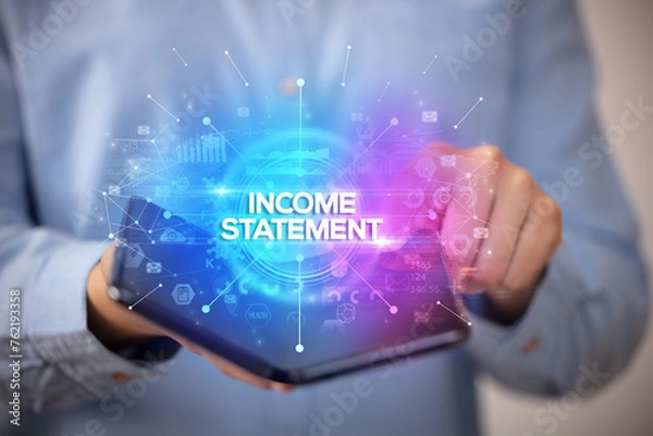 Fototapeta Businessman holding a foldable smartphone, new business concept