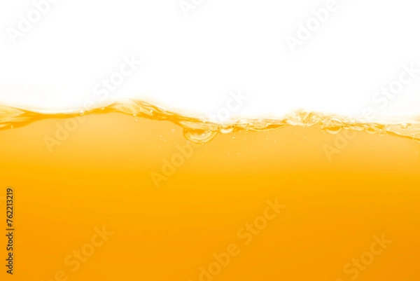 Fototapeta Close up bright orange juice texture for health and nature waves