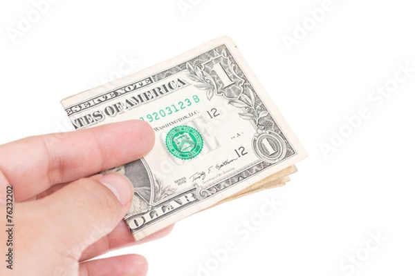 Fototapeta Money with hand isolated on white background