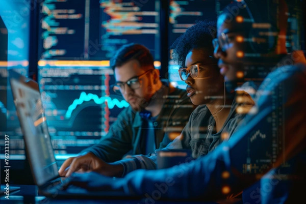 Fototapeta Portrait of Two Diverse Developers Using Laptop Computer Discussing Lines of Code that Appear on Big Screens Surrounding Them. Male and Female Programmers Creating Software Together and Fixing Bugs