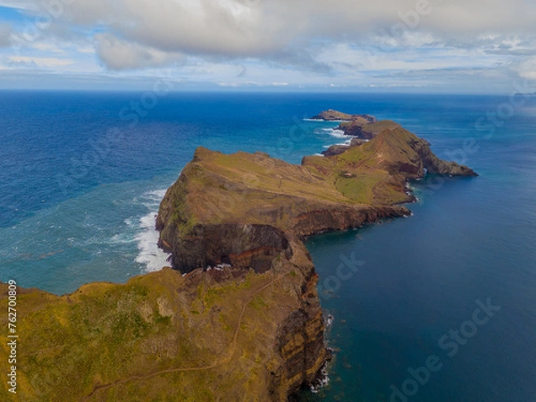 Fototapeta Sao Lourenco peninsula on Madeira from an aerial view.
Drone photos of Ponta de São Lourenço with ocean waves and clouds.