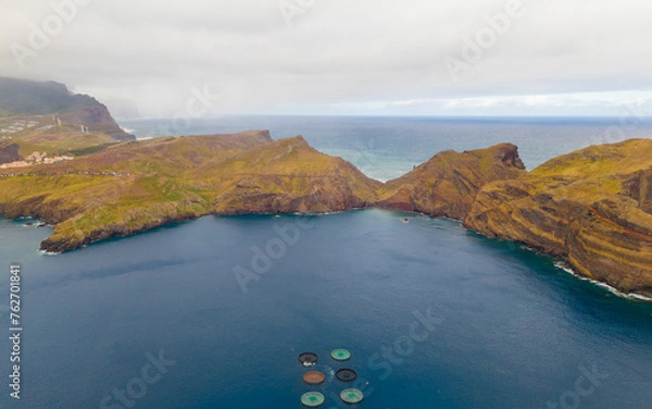 Fototapeta Sao Lourenco peninsula on Madeira from an aerial view.
Drone photos of Ponta de São Lourenço with ocean waves and clouds.