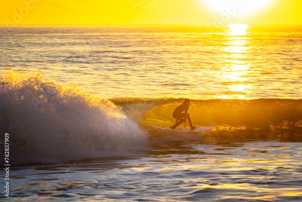 Obraz Surfer Rides Wave in Southern California