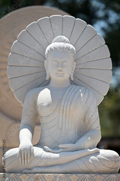 Obraz white stone buddha located outside