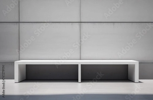 Obraz White minimalistic bench against gray concrete wall. Daylight. Copy space, place for text, empty space.