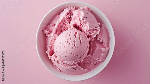 Fototapeta Bowl of pink ice cream isolated on pink background. Top view