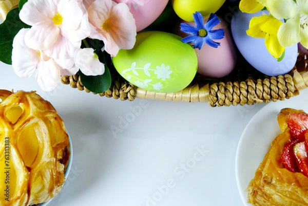 Fototapeta Bakery with colorful Easter Eggs in the basket celebrate Easter Day Festival backgrounds promotional materials design idea copy space stock photo